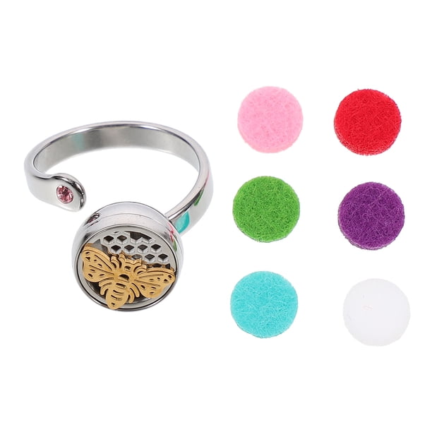 Anillos abiertos ajustables de acero inoxidable con aceite esencial hueco en oro de 14 quilates.