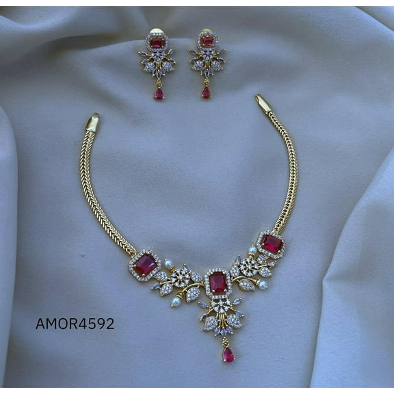 South Indian Bollywood Floral Hasli Necklace Set – Affordable Gold-Plated Matte Finish Brass with Ruby Kemp Stones, AD CZ & Matching Drop Earrings.