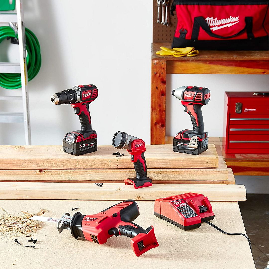 Milwaukee 2695-24 M18 18V Cordless Power Tool Combo Kit with Hammer Drill, Impact Driver, Reciprocating Saw and Work Light, 2 Batteries, Charger and Tool Case Included