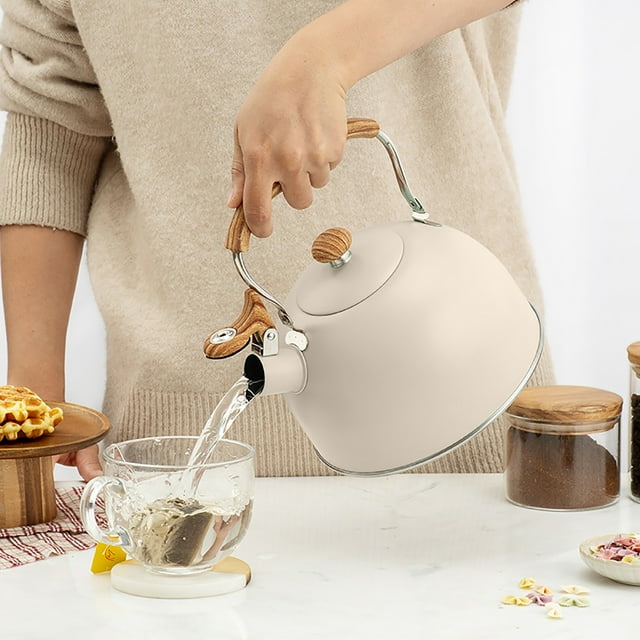 Retro Kitchen Teapot for Stove Top with Classic Pattern Handle and Loud Whistle Stainless Steel Tea Kettle for Coffee Milk and Boiling Water Durable Food Grade Construction for Everyday Use