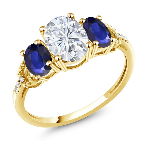 Gem Stone King 5.19 Cttw 10K Yellow Gold Oval Moissanite Blue Sapphire and Diamond Accent 3-Stone Ring | Three Stone Wedding Anniversary Promise Ring for Women (Size 7)
