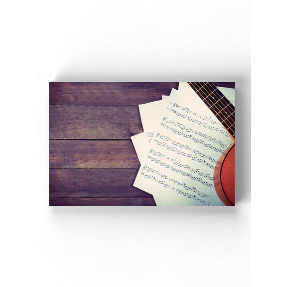 Guitar And Musical Sheets Wrapped Canvas  -Image by Shutterstock,