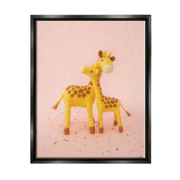Stupell Industries Pastel Pink Hugging Giraffes Animals & Insects Photography Black Floater Framed Art Print Wall Art