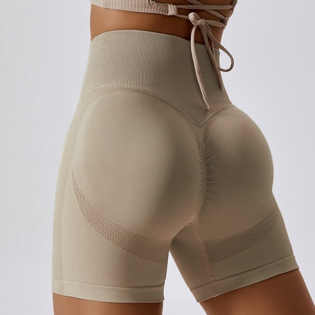 Pantalones cortos de yoga sin costuras europeos y americanos, pantalones cortos ajustados de cintura alta con caderas color melocotón para correr para niñas