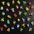 thumbnail image 6 of Disney Doorables Neon Glow Peek Figures, 1.5-inch Collectible Figurines, Kids Toys for Ages 5 up, 6 of 10