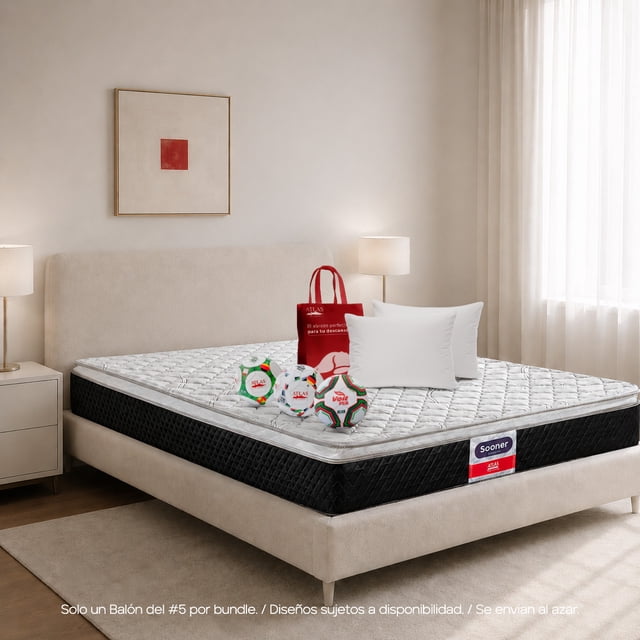 colchón queen size + almohadas atlas basic colchón Queen Size con Pillow Top y forro jacquard capitonado, vista 3/4 en cama tapizada; superficie acolchada blanca, banda lateral negra con etiqueta roja 'Sooner', dos almohadas blancas y bolsa promocional con balones. Firmeza media; medidas aproximadas 150 x 190 x 26 cm. También suele usarse para habitaciones de huéspedes o alquileres temporales.