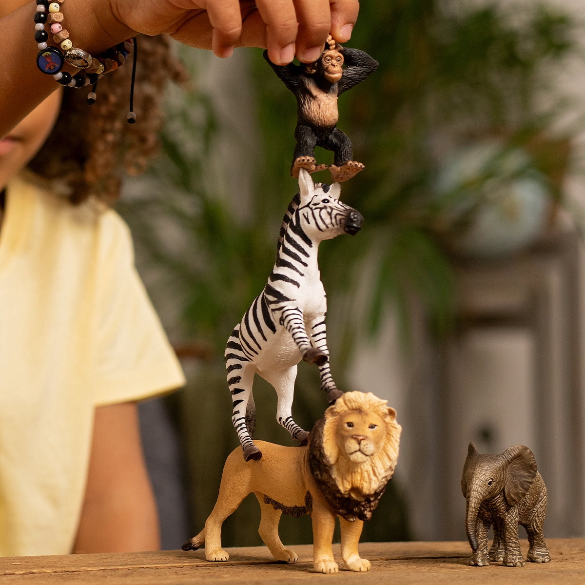 Schleich Wild Life Africa Starter Set - 4PC Wildlife Animal Set - With Zebra, Elephant Calf, Lion, Chimpanzee Figures - Kids 3+