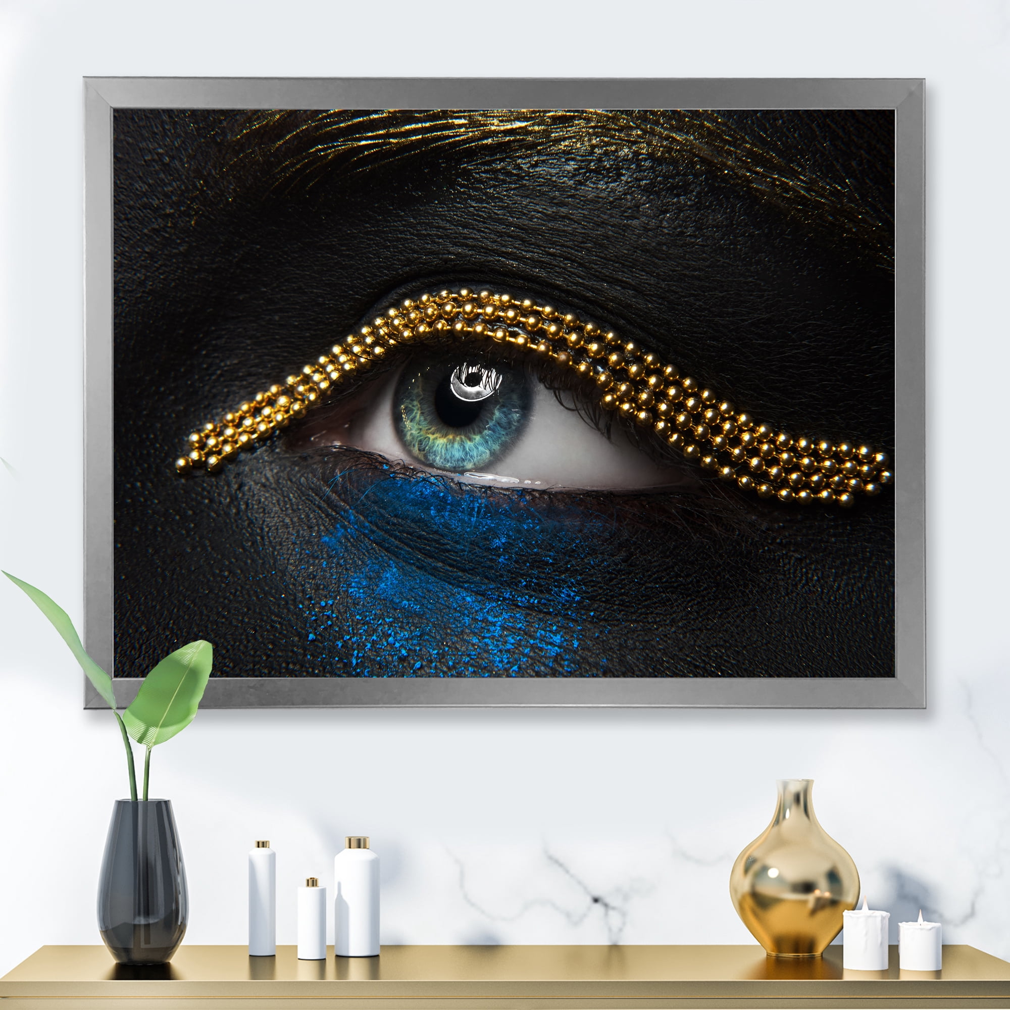 Designart 'Woman Eyes With Black Skin With A Gold Chain' Modern Framed Art Print