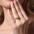 thumbnail image 4 of Gem Stone King 18K Rose Gold Plated Silver Canary Mystic Topaz Swiss Blue Topaz and White Moissanite Engagement Ring for Women (1.57 Cttw, Gemstone, Round 6MM and 3MM, Size 7), 4 of 4