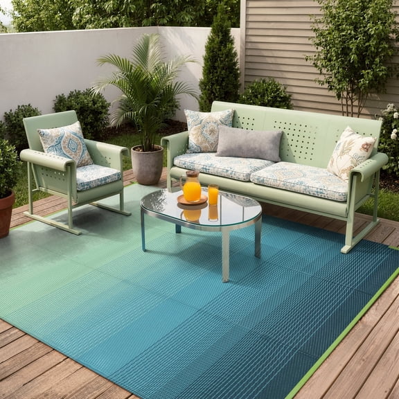 SUNDEREY Outdoor Rug 6'x9', Waterproof Reversible Plastic Straw Mat for Patio, RV & Camping - Lightweight Carpet for Deck, Balcony & Backyard, Teal
