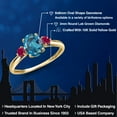 thumbnail image 2 of Gem Stone King 10K Yellow Gold London Blue Topaz and Red Created Ruby 3-Stone Ring for Women | 1.78 Cttw | Oval 8X6MM | Gemstone November Birthstone | Size 8, 2 of 6