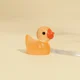 thumbnail image 1 of Mini adorno de pato amarillo fluorescente, figuras en miniatura, artesanía de resina pequeña, micropaisaje, decoración para casa de muñecas DIY, 10-100 Uds., 1 of 5