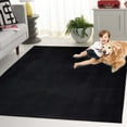 thumbnail image 5 of SAFAVIEH Faux Rabbit Fur Daven Solid Area Rug, Black, 4' x 6', 5 of 13