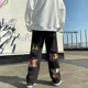 thumbnail image 2 of Pantalones vaqueros con estampado para hombre, pantalones vaqueros para hombre, pantalones gráficos, pierna ancha, rectos, ropa de calle, diseñador, moda coreana, negro, novedad de 2024, 2 of 4