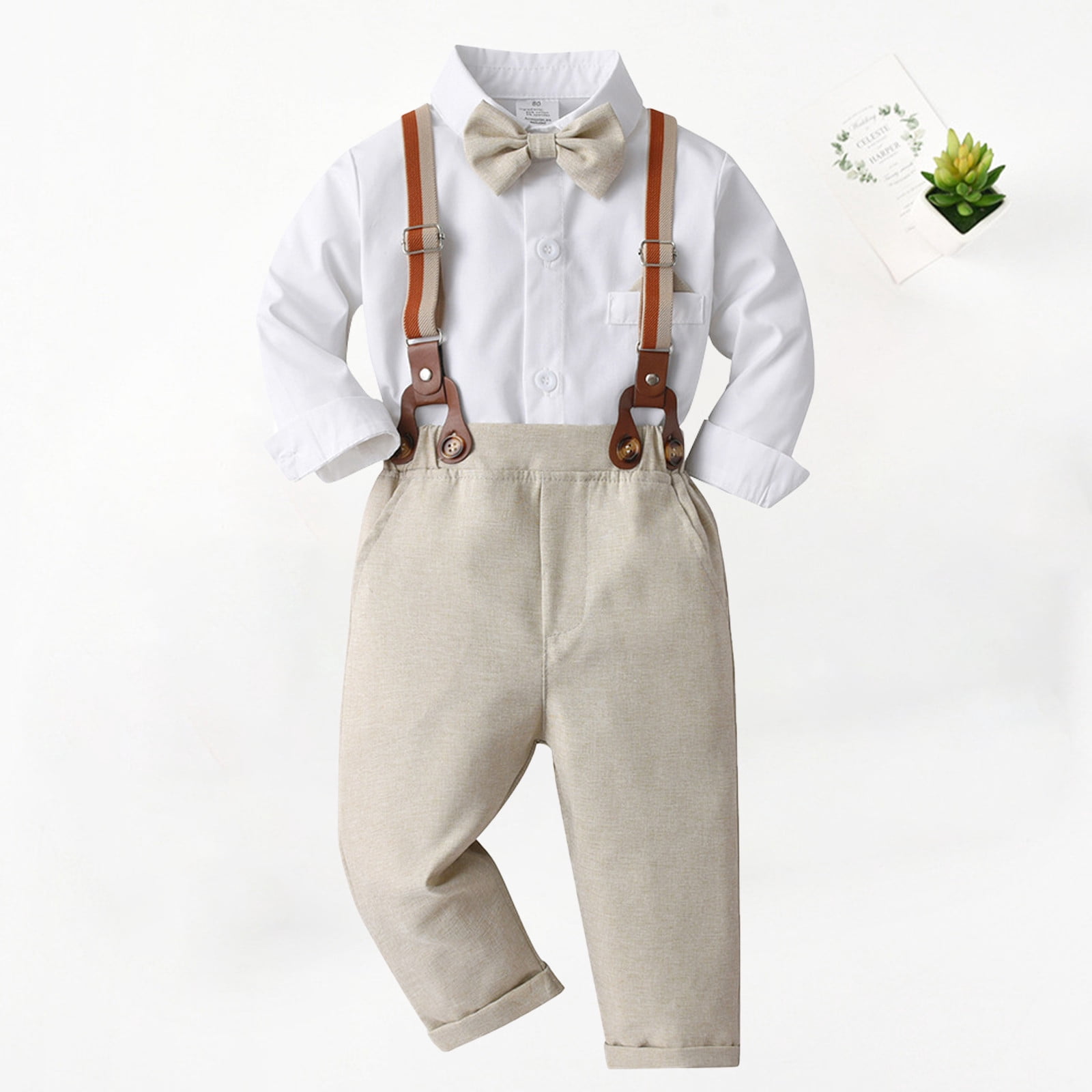 beige bow tie and suspenders
