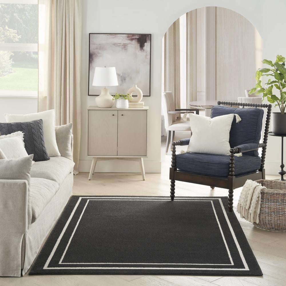 Nourison Essentials Indoor/Outdoor Black Ivory 5' x 7' Area Rug, (5x7)