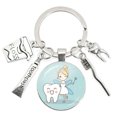thumbnail image 1 of Llavero con forma de diente de cepillo de dientes y pasta de dientes, colgante redondo de cristal para bolso de moda, 1 of 6