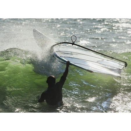 A Man In The Water Holding Onto His Windsurfing Board Tarifa Cadiz Andalusia Spain Stretched Canvas - Ben Welsh  Design Pics (18 x (Best Windsurfing Boards For Intermediate)