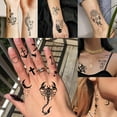 thumbnail image 3 of baomifa-52 Sheets Creative Black Tiny Crown Infinity Triangle Fake Tattoos For Men Women Realistic Stars Letters Tattoos For Kids Tattoos Temporary Waterproof Arm Hand Face Finger Neck Tatoo Stickers, 3 of 4