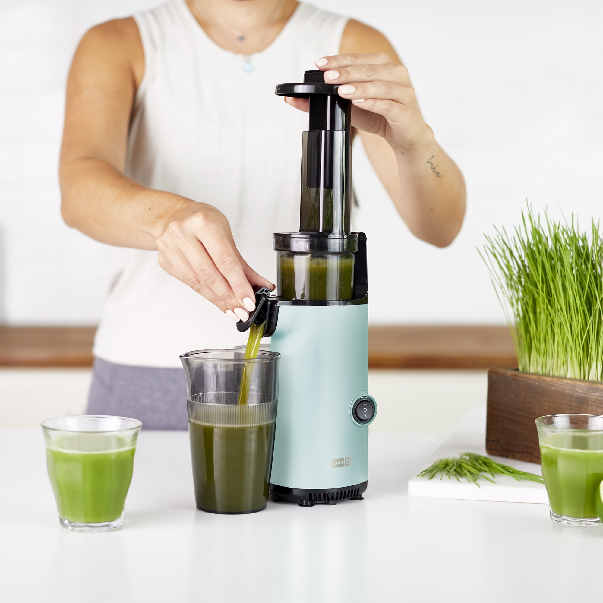 DASH Compact Slow Juicer, Easy to Clean Cold Press Juicer with Brush, Pulp Measuring Cup and Juice Recipe Guide - Aqua -