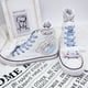 thumbnail image 1 of 2024 zapatos blancos de verano y otoño nuevo estilo jade canela perro zapatos de lona de caña alta para niñas y niñas corazón ins graffiti versión coreana tendencia versátil, 1 of 5
