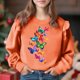 thumbnail image 1 of Vestido de verano para niña con estampado de flores de Pascua, manga corta, bolsillos con volantes y cuello redondo, top de poliéster, 1 of 5