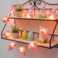 thumbnail image 4 of Guirnalda de luces de conejo de Pascua | Luces navideñas de zanahoria rosa para decoración de interiores y exteriores | Guirnalda de luces de 300 cm para Pascua, Halloween, fiestas navideñas y, 4 of 9