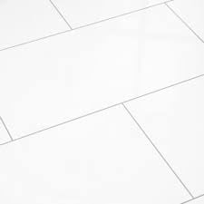 Elesgo Maxi V5 Tile Format super Gloss Laminate Floor in Arctic White 26.70 Sq. (Best Floor Tile Material)