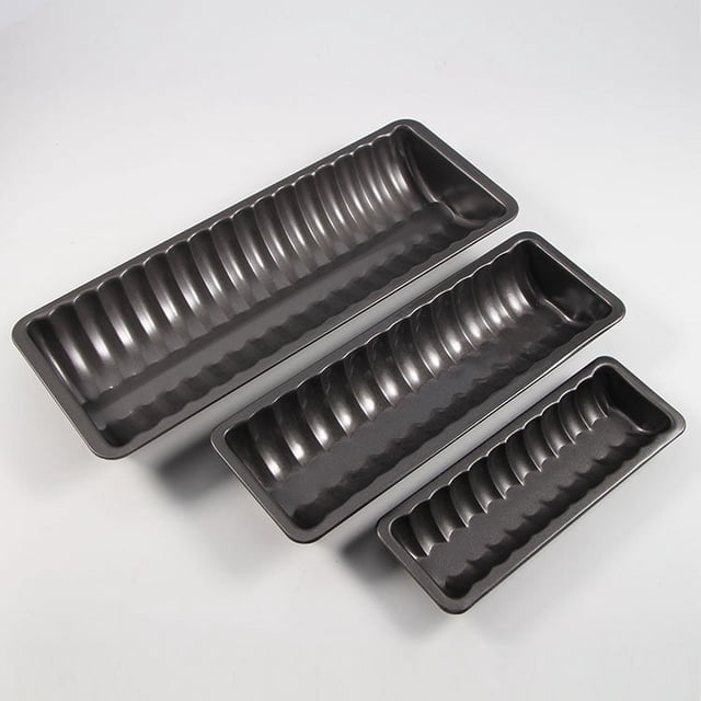 3 Size Carbon Steel Almond Cake Loaf Pan set with non-stick coating, ideal for baking bread, almond cakes, and other desserts. The ribbed interiors ensure even baking, while the flat backbone adds stability. Perfect for bakeware enthusiasts and kitchen accessories, displayed on a white surface.