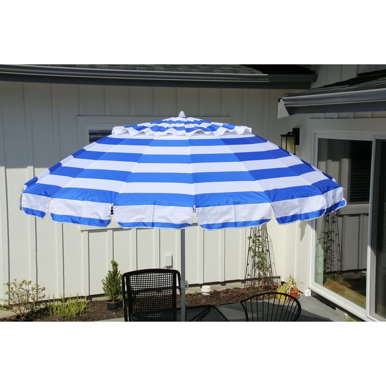 blue and white striped patio umbrella walmart Safavieh Maui Single Scallop 9Ft Crank Push Button Tilt perfect for adding shade to your outdoor space Walmart patio inspiration. https://liketk.it/5RfM2