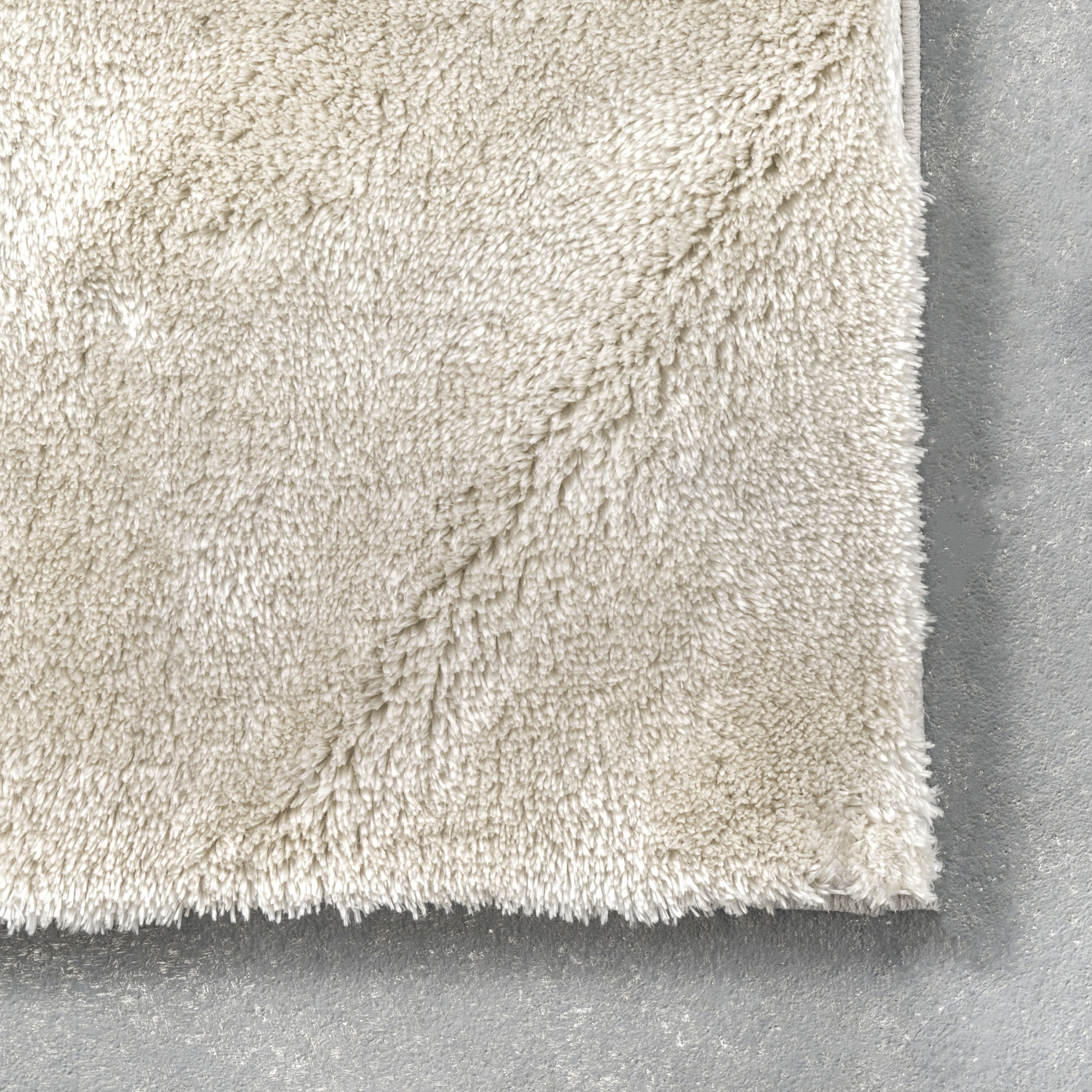 nuLOOM Loni SuperiorWash Solid Machine Washable Shag Area Rug, 2' x 3', Loni Cream