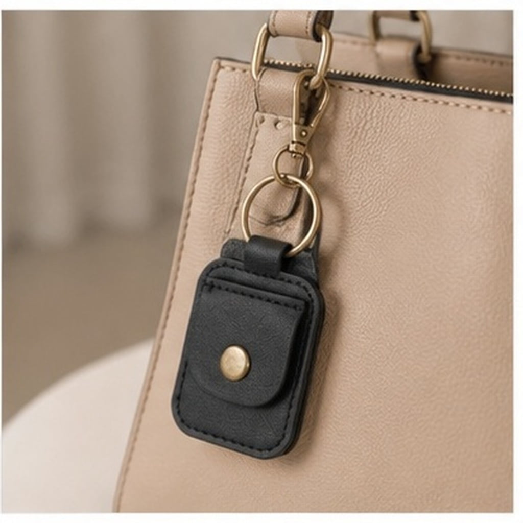 HINTRMENT Portable Black PU Coin Holder Keychain Pouch for Travel with Multifunctional Storage and Stylish Design