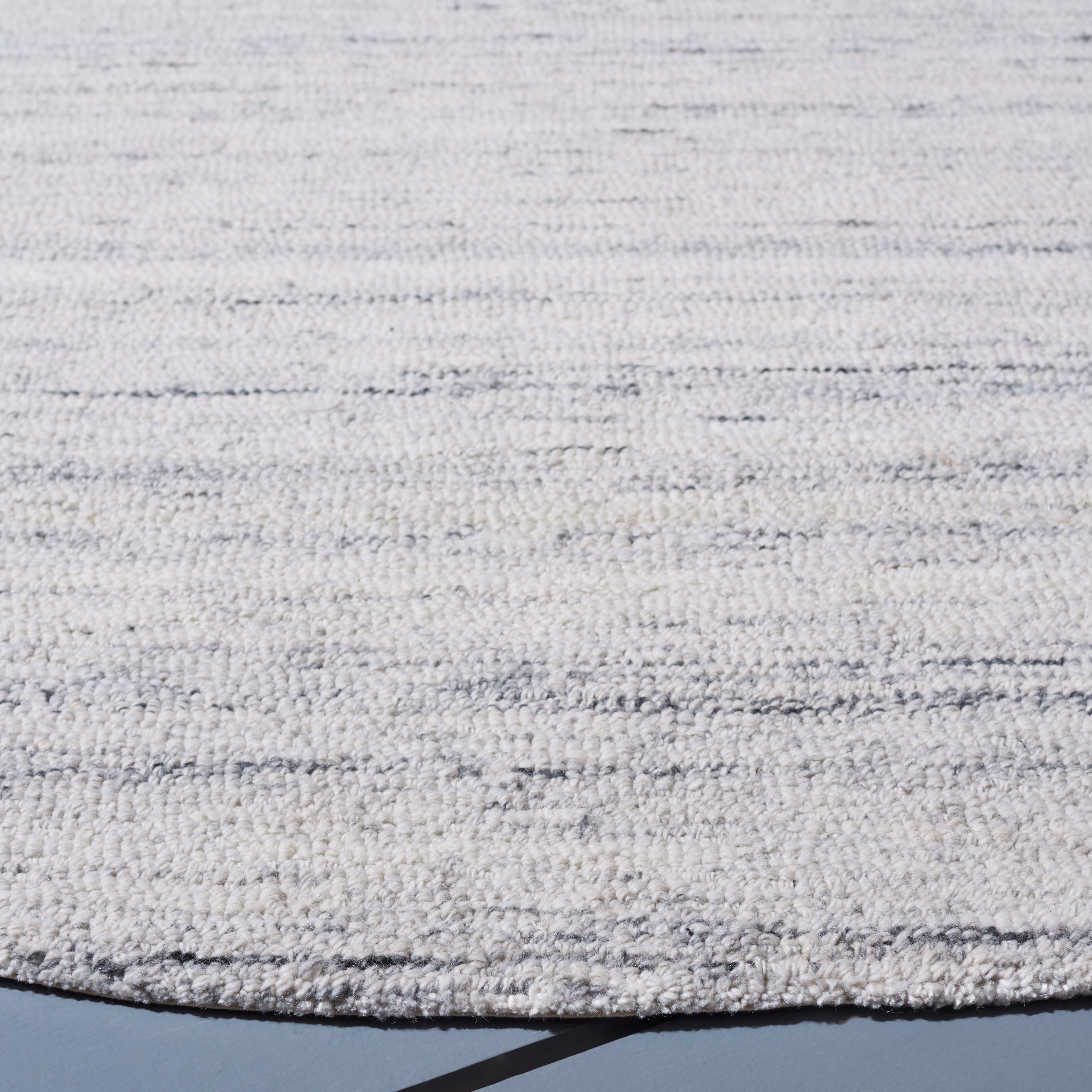 SAFAVIEH Outdoor Micro-Loop Garrett Solid Indoor/Outdoor Area Rug, Ivory, 6' x 6' Round