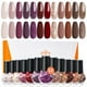 thumbnail image 1 of Set de esmaltes de uñas Modelones, 12 colores, rojo burdeos y dorado, 1 of 7