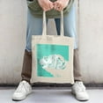 thumbnail image 2 of Stylish Natural Canvas Tote Bag with Intricate White Cloud Design on Turquoise Background - Perfect for Shopping Travel & Parties, 2 of 4