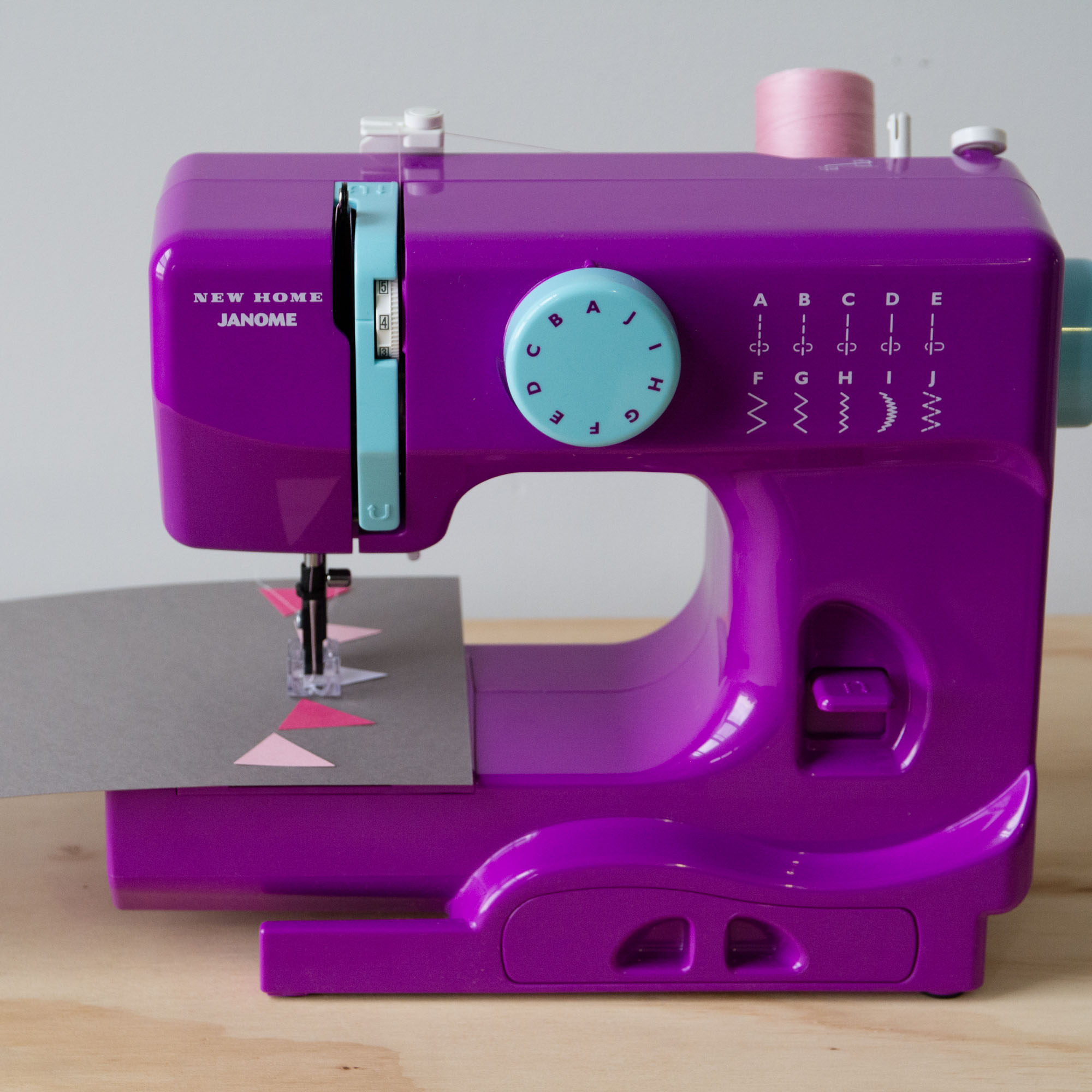 Janome Basic 10-Stitch Portable Sewing Machine with Top Drop-In Bobbin, 4-Piece Feed Dog and Accessory Storage, Purple Thunder - image 2 of 10