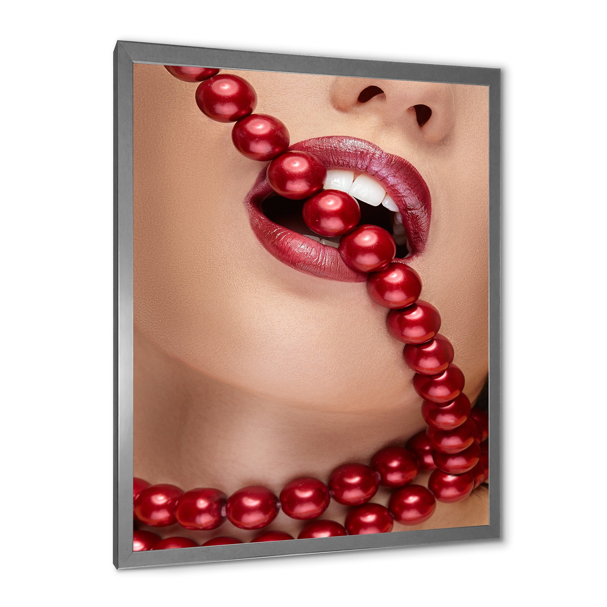 Designart 'Girl Mouth With Red Lipstick Biting Red Pearls' Modern Framed Art Print