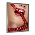 thumbnail image 2 of Designart 'Girl Mouth With Red Lipstick Biting Red Pearls' Modern Framed Art Print, 2 of 4