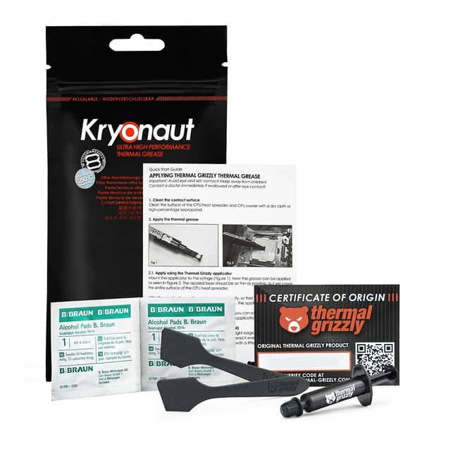 grasa térmica thermal grizzly kryonaut de 1 g con espátula y almohadillas Paquete negro con logotipo Kryonaut en blanco y naranja; incluye jeringa de 1 g con boquilla, espátula plástica negra, dos almohadillas de limpieza y tarjeta de certificado, vista cenital; adecuado para refrigeración de CPU y overclocking extremo.