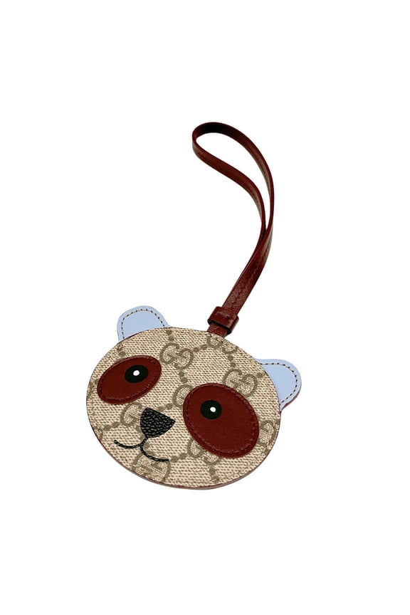 Pre-Owned Gucci GG emblem panda-shaped bag charm for men and women, made of Supreme canvas in...