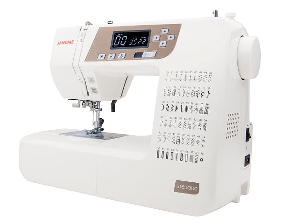 Janome 3160QDC-T Sewing and Quilting Machine with Bonus Quilt Kit!