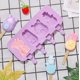 thumbnail image 3 of Molde de silicona rectangular creativo de 4 cavidades: formas de cerdo, conejo, oso y muñeco de nieve, perfecto for hacer paletas heladas y helados de verano, 3 of 5
