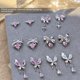 thumbnail image 1 of Colgante de lazo de circonita rosa con diamantes para uñas, joyería ligera de lujo, mariposa plateada, amor, diamantes en línea, 1 of 5