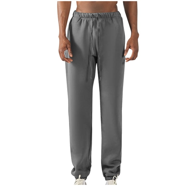 Pantalones largos para hombre, con cintura elástica, color liso, con cordón y bolsillos, de poliéster.
