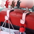 thumbnail image 1 of Gancho de reposacabezas multifuncional para coche | Gancho de plástico tipo cerradura para el asiento trasero | Soporte para teléfono y colgador de bolsa | Se adapta a la mayoría de los coches, 1 of 8