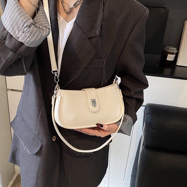 Bolso pequeño de alta gama para mujer, primavera 2025, sencillo y versátil, tipo baguette, diseño de nicho, con un solo hombro y bandolera.