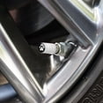thumbnail image 2 of Paw Print Dog Cat White on Black Tire Rim Wheel Aluminum Valve Stem Caps, 2 of 3
