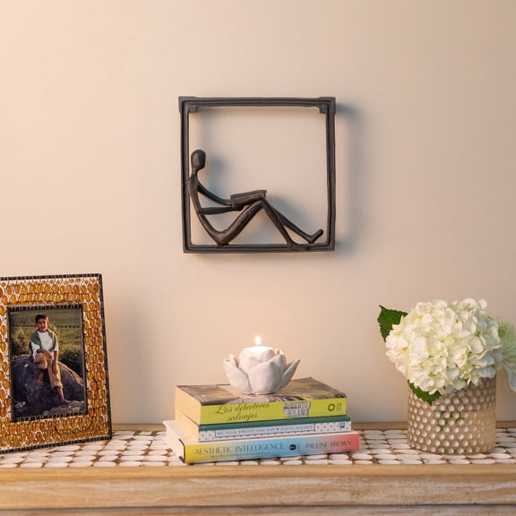 Danya B. Man Reading on a Window Sill Hanging Wall Art Iron Sculpture