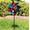 B, variant on Yooshoverk Lawn Windmill Stake Spinner Durable Design Eye-Catching Motion Weather-Resistant Outdoor Garden Yard Decor