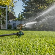 Orbit Brass Impact Pulsating Lawn Sprinkler on Metal Step Spike